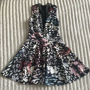 Bebe V-neckline Animal print and half Mesh on the back, Sleeveless Dress